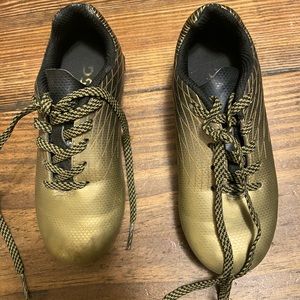 DSG gold soccer cleats, size 11 little kids.